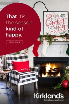 a living room decorated for christmas with stockings on the fireplace