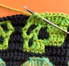 the crochet stitch is being worked on