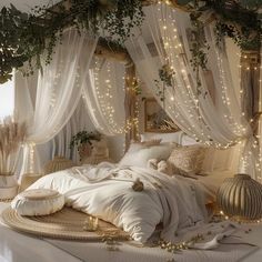 a bed with white sheets and lights on the headboard is in a room that looks like it has been decorated for christmas