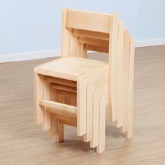 a wooden chair and table on the floor