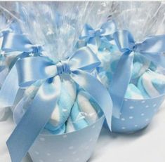 two baskets filled with blue and white candy