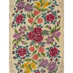 an old rug with colorful flowers on it