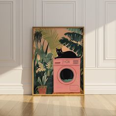 a cat sitting on top of a pink washing machine