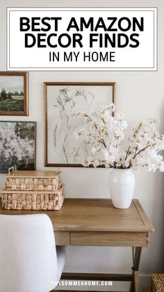 a desk with flowers and pictures on the wall above it that says best amazon decor finds in my home