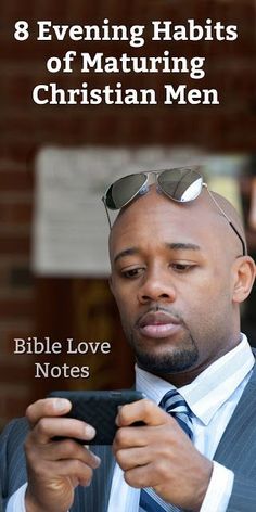 a man in suit and tie looking at his cell phone with the text 8 evening habitts of maturing christian men bible love notes