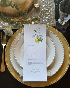 the place setting is ready to be served at this elegant wedding breakfasteonary in gold and white