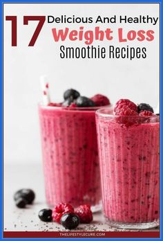 two glasses filled with smoothie and berries