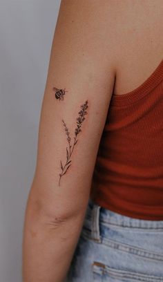 70+ Beautiful Tattoo Designs For Women : Lavender spring with a bumble bee Small Bees Tattoo, Womens Bee Tattoo, Simple Bee And Flower Tattoo, Honeybee Tattoo Flowers, Small Bee With Flower Tattoo, Flowers Bee Tattoo, Larkspur And Bee Tattoo, Small Honey Tattoo, Lavender Tattoos For Women