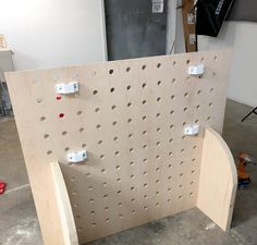 there are several pegboards attached to the wall