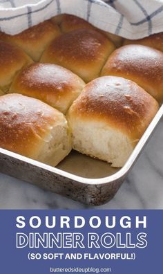 some rolls in a pan with the words sourdough dinner rolls so soft and flavorful