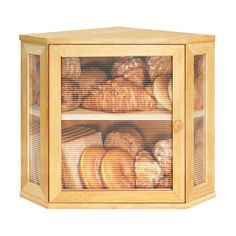 a wooden cabinet filled with lots of different types of breads and pastries in it