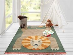 two stuffed animals sitting on a rug in front of a window with a teepee tent