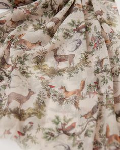 Embark on an enchanting adventure with our A Night's Tale Woodland Lightweight Scarf in Crystal Grey. Inspired by Chaucer's 'The Knight's Tale', our A Night's Tale print is set on a winter's night, beneath the moon where our furry & feathered friends gather to tell secrets of nature's wonder. Drape it around your n Fable England, Light Weight Scarf, A Knight's Tale, Small Scarf, Woodland Scene, Crystal Light, Beer Gifts, Lightweight Scarf, Winter Night