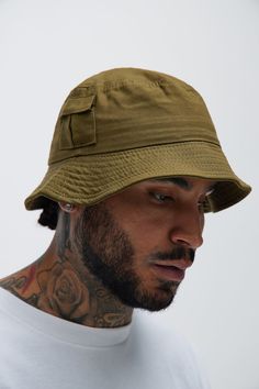 Available In Olive. Bucket Hat Solid Color Contrast Stitching Cargo Pocket Detail Imported California Proposition 65 WARNING: Cancer and Reproductive Harm - www.P65Warnings.ca.gov. | Mens No Empty Pockets Bucket Hat in Olive Green by Fashion Nova Men In Bucket Hats, Bucket Hat Outfit Mens, Men Bucket Hat, Bucket Hats For Men, Bucket Hat Outfit, Olive Bucket, Olive Fashion, Mens Bucket Hats, Travel Hat