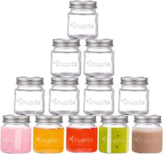 there are many jars with different colored liquids in each jar and one is empty