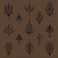 a brown paper with black designs on it