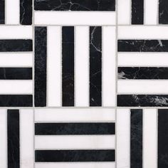 black and white marble tiles with vertical stripes