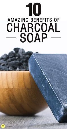 a soap bar sitting on top of a wooden bowl filled with black beans and text overlay reading 10 amazing benefits of charcoal soap