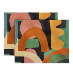 two placemats with abstract designs on them, one in green and the other in orange