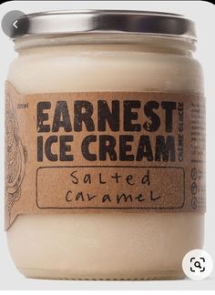 a jar of vanilla ice cream with a label on the front that says, earliest ice cream salted caramel