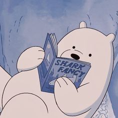 a polar bear reading a comic book in the snow