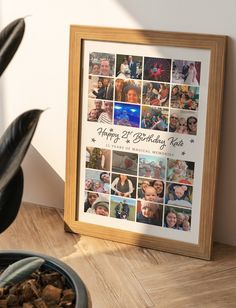 a wooden frame with many photos on it next to a plant and potted plant