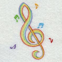 an embroidered musical note with music notes on the bottom and rainbow colors in the middle