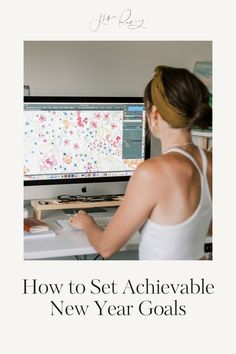 a woman sitting at a desk in front of a computer with the title how to set achievable new year goals