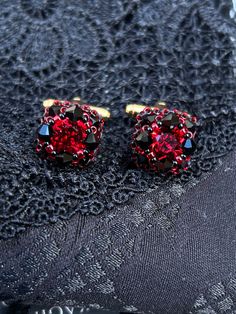 Whatever you wear them at special occasions or just to add a dash of uniqueness to your office outfit , you can't go wrong with this lovely handmade cufflinks . They are carefully crafted with Serenity and Swarovski crystals , gold plated bar and Japanese seed beads . The approximate measurements of cufflinks is 1x1 centimetres. Elegant Red Cufflinks For Formal Occasions, Elegant Beaded Cuff Jewelry, Classic Cuff Jewelry For Party, Handmade Cuff Jewelry For Anniversary, Beaded Cuff Jewelry Gift, Elegant Beaded Clip-on Earrings For Formal Occasions, Luxury Red Clip-on Earrings As Gift, Elegant Clip-on Cufflinks For Gift, Party Cuff Beaded Jewelry