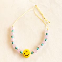 Happy Happy Adjustable Anklet - a beautiful piece of jewelry that is sure to bring a smile to your face every time you wear it.  Crafted from exquisite turquoise, rose quartz stones, and a playful glass smiley icon bead, each bead is carefully selected for its unique color and natural sparkle, creating a playful and cheerful design.  The adjustable length of this anklet ensures a perfect fit for any ankle size, making it a versatile accessory that can be worn by anyone. The secure clasp ensures Adjustable Anklet, Positive Design, Turquoise Rose, September Birthstone Jewelry, August Birthstone Jewelry, July Birthstone Jewelry, Zodiac Jewelry, Rose Quartz Stone, Jewelry Ring Box