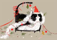 a black and white cat wearing a santa hat sitting on top of a chair next to christmas decorations