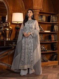 Brand: SIFAProduct Code: FU-23-08-EnoraCollection: SIFA Lueur Unstitched Luxury Formal Collection DESCRIPTION﻿: The aesthetic outfit features a graceful yet elegant silhouette with captivating floral embroidery in shades of blue embellished with sequins and tilla, fully embroidered front with pronominal embroidery on its border. It is paired with beautifully composed dupatta with color blocking and embroidery details on it paired with raw silk trouser. It’s a perfect outfit for any festive event Chiffon Dresses, Elegant Embroidery, Chiffon Fashion, Silk Trousers, Pakistani Suits, Chiffon Shirt, Fabric Stores Online, Formal Outfit, Formal Looks