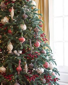 a christmas tree decorated with ornaments and lights