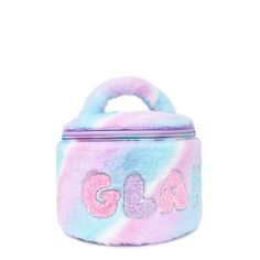 Soft and stylish, this 'GLAM' punchy pastel ombre plush glam bag is the ultimate organization essential! Detailed with pastel bubble letter applique patches. Your mini will fall in love with this perfectly plush packing must-have! Measures Approx. -5.50”H x 7.50”W x 7.50”DManufacturer Style No. - GLM-RTC105 Letter Applique, Ultimate Organization, Pastel Ombre, Bubble Letter, Ombre Design, Organization Essentials, Applique Patches, Glam Bag, Purse Gift