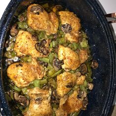 chicken and green beans in a skillet on the stove