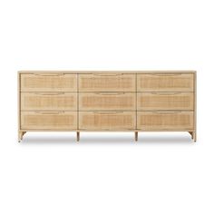 the sideboard is made out of wood and has four drawers, one with an open drawer