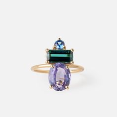 Solid 14k gold cocktail ring in our Candy Collection. This ring features sapphire, tourmaline, and amethyst gemstones. Handmade by our master goldsmith in Seattle and is one-of-a-kind. Finger size 7. Do not wear if you are doing an activity that is particularly hard on your hands. Clean with fine jewelry cleaner every few months to keep the sparkle alive. Purple Sapphire, Gold Cocktail Ring, August Birthstone Jewelry, July Birthstone Jewelry, Men's Jewelry Rings, Jewelry Ring Box, Pearl Jewellery Earrings, August Birth Stone, Evil Eye Jewelry