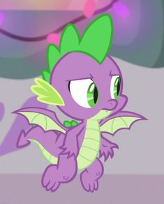 a purple dragon with green wings flying through the air