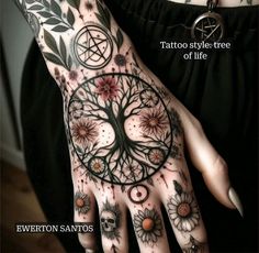 a woman's hand with tattoos on it and the words tattoo style tree of life