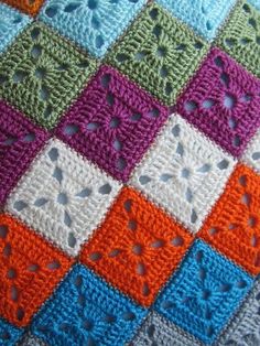 a crocheted blanket that has been made to look like squares