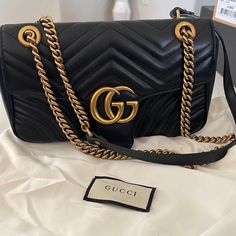 Gucci Gg Marmont Small Shoulder Bag, Black Leather, Only Been Carried Handful Of Times. I Don’t Have The Box For It Only The Duster. No Scratches. 100% Authentic Gucci Rectangular Shoulder Bag With Gold-tone Logo, Gucci Rectangular Bag With Gold-tone Logo Plaque, Gucci Gold Bag With Gold-tone Logo Plaque, Elegant Gucci Bag With Gold-tone Logo Plaque, Luxury Gucci Shoulder Bag With Original Box, Designer Gucci Gold Bags, Gold Gucci Bag With Original Box, Luxury Gucci Bag With Gold-tone Logo Plaque, Gucci Black Bag As Gift