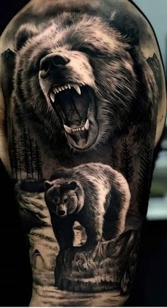 a man's back with a bear and cub tattoo on his left upper arm