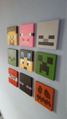 some pixel art is hanging on the wall