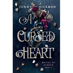 a book cover with flowers on it and the words a cursed heart written in white