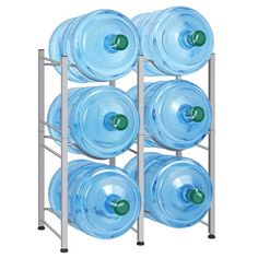 a rack with six large blue plastic water bottles on it's sides and two metal racks holding them