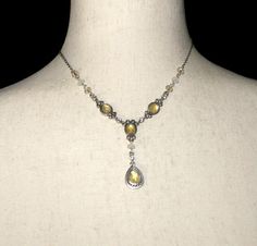 This item is a vintage Avon silver tone y-necklace with yellow, clear and white plastic and clear rhinestones. This necklace is 16 inches with a lobster claw clasp and Avon hallmark. DETAILS: ☼ Approximately 16 inches. ☼ Approximately 10.9 grams, total weight. ☼ ☼ ☼ ☼ ☼ ☼ ☼ ☼ ☼ ☼ ☼ ☼ ☼ ☼ ☼ ☼ ☼ ☼ ☼ ☼ ☼ PLEASE NOTE:  ☼ Different items on SALE everyday!  Check back often to take advantage of these bargains! ☼ FREE DOMESTIC SHIPPING on purchases of $35 or more. Combined shipping is still available t 90s Jewelry, Weird Jewelry, Yellow Gems, Avon Vintage, Wire Jewelry Designs, Y Necklace, Gem Necklace, Vintage Avon