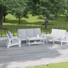 a white patio furniture set on a deck