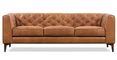 a tan leather couch with wooden legs and buttons on the armrests, against a white background