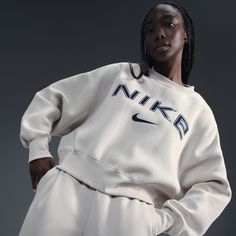 Grounded in style, comfort and versatility, meet our take on luxury loungewear. This sweatshirt's voluminous fit and slightly cropped length come together to give you an easygoing look that's anything but basic. Nike Sweat Set, Nike Crewneck Sweatshirt Outfit, Sweatshirt Nike, Nike Sweaters, Nike Crewneck Sweatshirt White, Nike Crew Neck Sweatshirt For Sports, Nike Sweatshirt, Womens Nike Crewneck Sweatshirt, Cool Sweatshirts