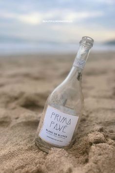 a bottle of rumma fave on the beach